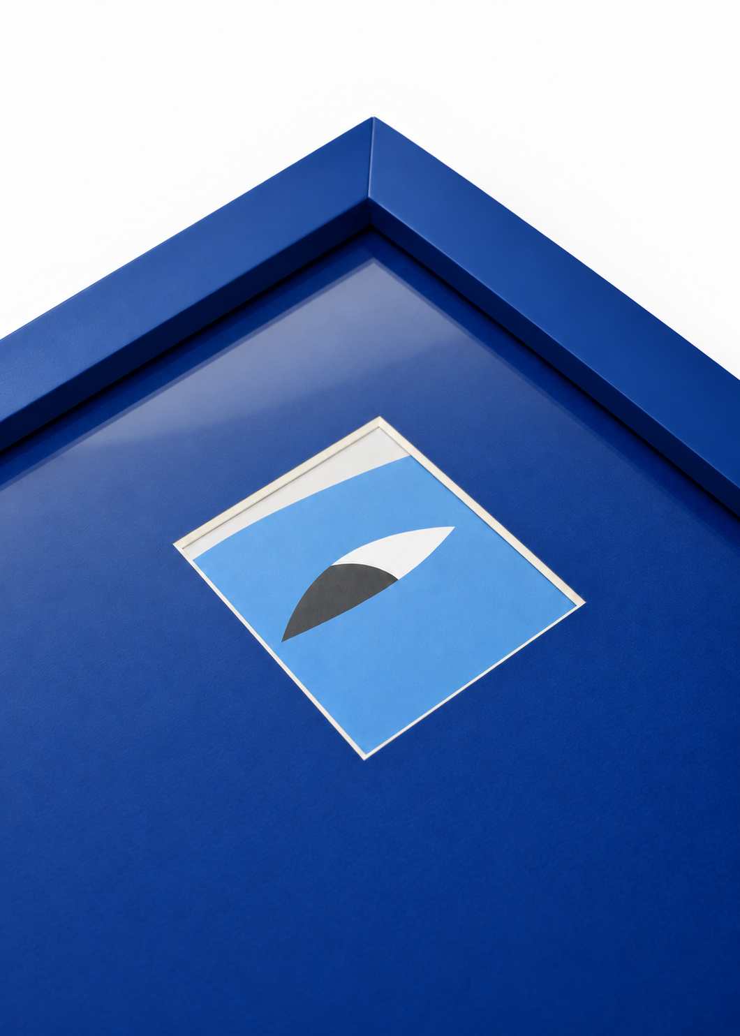 Close-up detail of the cobalt Peek-a-boo mini polaroid frame